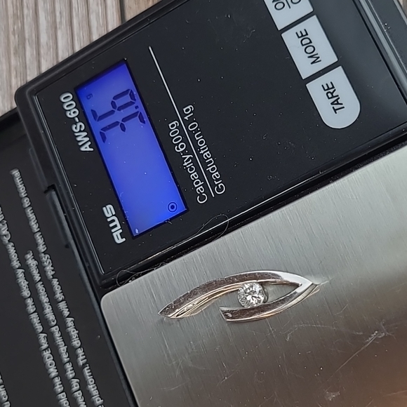 14KT WHITE GOLD TENSION SET DIAMOND PENDANT - Picture 13 of 13